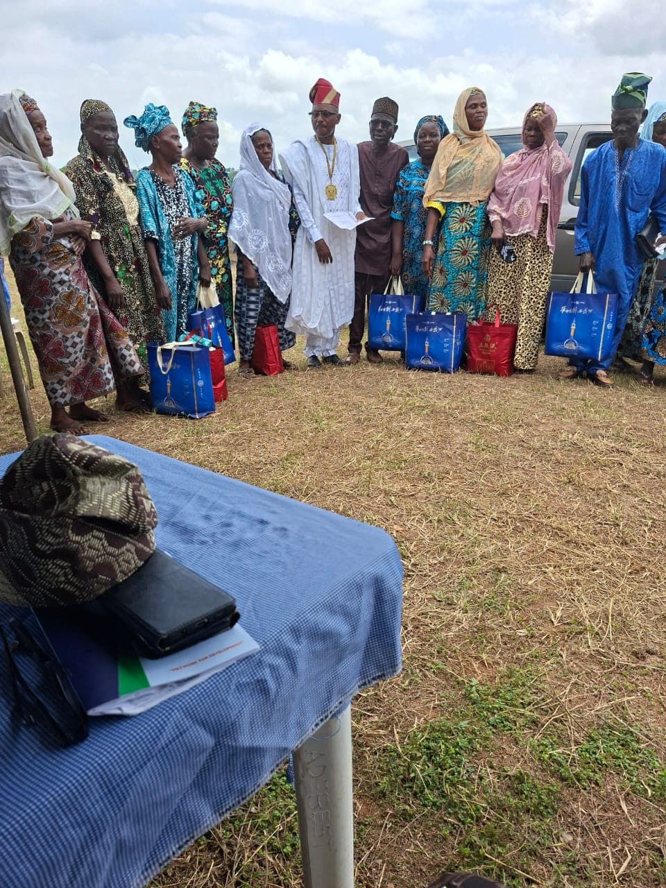 women-receiving-palliatives-from-manca-in-ayetoro